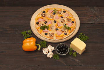pizza on a wooden background