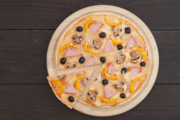 pizza on a wooden background