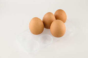Four fresh rustic eggs