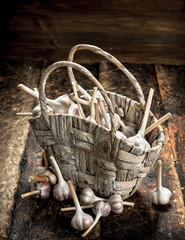 Fresh garlic in a basket.