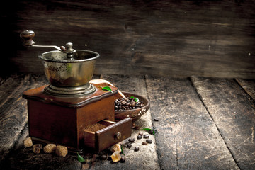 Coffee grinder with coffee beans.