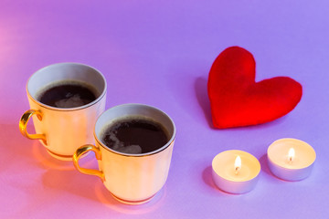 two vintage coffee cups and red handmade hart figure on purple b, smoke, steam
