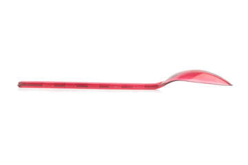 Red plastic spoon isolated on white