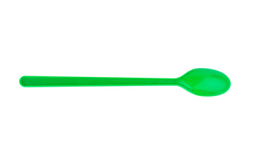 green spoon plastic isolated on white background
