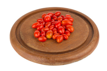 baby tomatoes on chopping isolated on white background