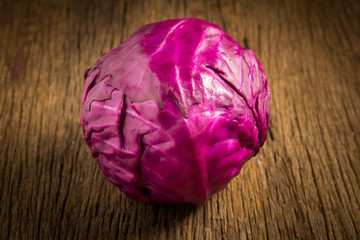 cabbage purple on wooden. kitchen. morning
