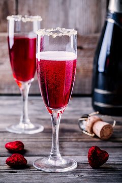 Refreshing cocktail with champagne and cranberry for Valentine's day