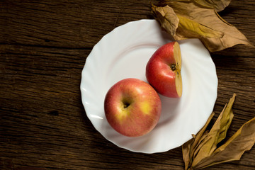 Apples on wooden background