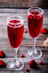 Refreshing cocktail with champagne and cranberry for Valentine's day