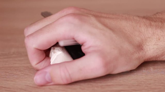 Hand covering pack with drugs, spoon and lighter