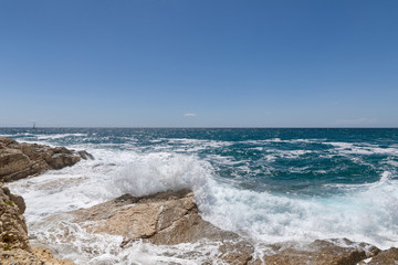 Rocky shore of the Adriatic sea after storm