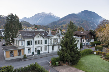 Interlaken,Switzerland. 31 October 2017 : Old Swiss House in old town area  Interlaken with Mountain.