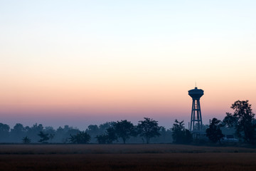 Water tank tower with early morning.