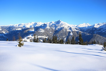 Fototapeta premium Wintery mountain landscape with sunshine