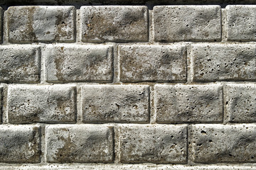 Brickwork. Pattern of decorative brick surfaced. Rough brick wall.
