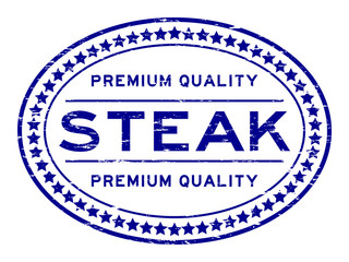 Grunge blue premium quality steak oval seal stamp on white background