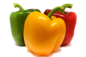 Yellow with green and red Sweet peppers background 