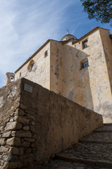 Obraz premium Corsica, 03/09/2017: dettagli della Cattedrale di Calvi, dedicata a San Giovanni Battista, antica chiesa cattolica nel centro dell'arroccata Cittadella di Calvi
