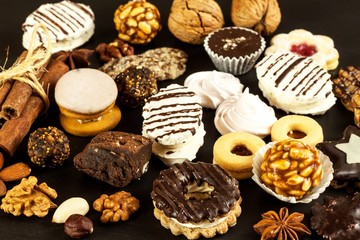 Home cookies on a dining table. Unhealthy sweet food. Dangers of obesity and diabetes.