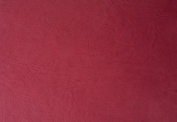 Red paint leather texture . Useful for abstract background with copy space.