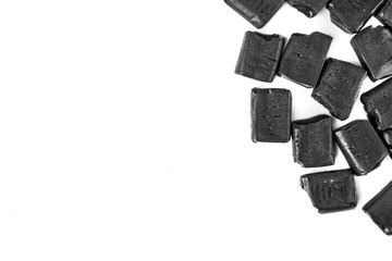 Aniseed flavor blackjack candy chews on white background with copy space
