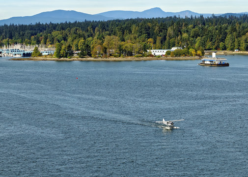 Taxying seaplane in Burrard Inlet, Vancouver, Canada