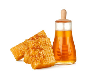 Aromatic honey in jar and honeycombs on white background