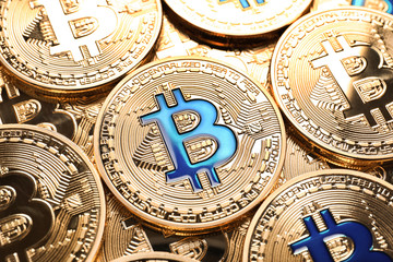 Fototapeta premium Many golden bitcoins, closeup