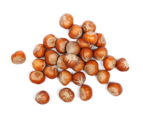 Hazelnuts isolated on white background, top view