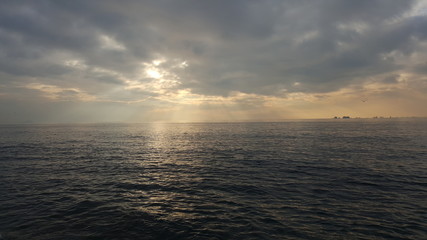 sunset on the sea. cloud and sun are very fantastic
