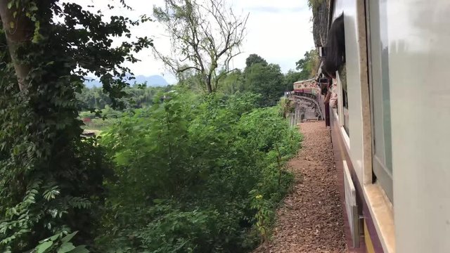 View from the train on the Death Railway passing by the Dangerous Curve in Lum Sum Kanchanaburi Thailand