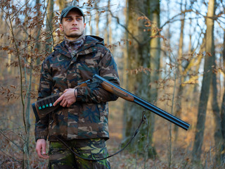 Fototapeta premium Hunter with shotgun