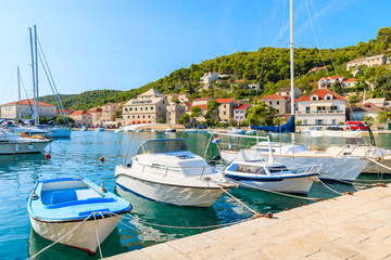Obraz premium Fishing and sailing boats in beautiful port of Pucisca, Brac island, Croatia