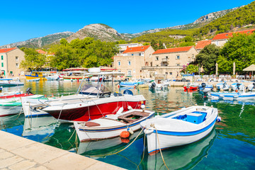 Fototapeta na wymiar View of Bol port with boats on sunny summer day, Brac island, Croatia