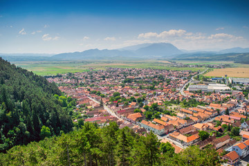 Fototapeta na wymiar Rasnov city, Romania. Panoramic view from Rasnov Castle