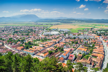 Fototapeta na wymiar Rasnov city, Romania. Panoramic view from Rasnov Castle