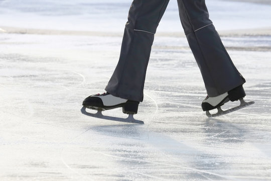 foot ice-skating person on the ice rink.