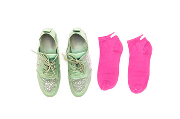 Stylish female sneakers shoes and socks isolated on white background.