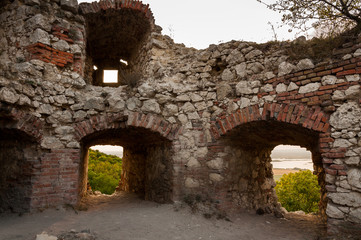A few tunnels in ruin with sky in background