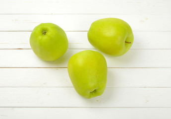 Three green apples