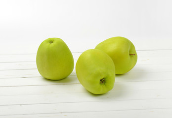 Three green apples