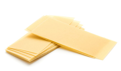 Lasagne raw dry two sheet stacks isolated on white background.