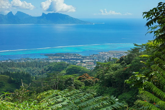 View from the mountains of the north-west coast of Tahiti with Moorea island in background, French Polynesia, south Pacific ocean