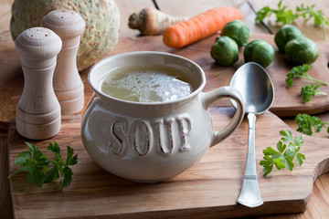 Bone broth made from chicken in a soup bowl