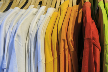 Color T shirts in a shop