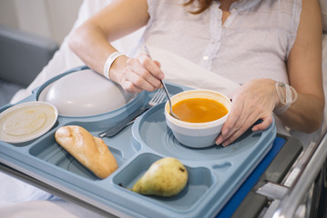 woman eating in the hospital