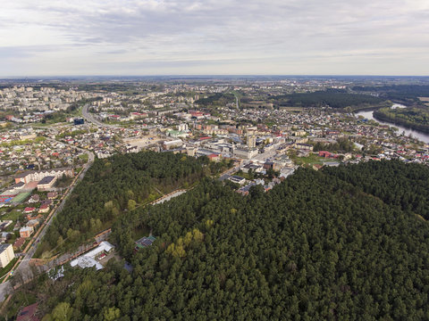 Aerial view over Alytus suburb, Lithuania. During cloudy summer day.