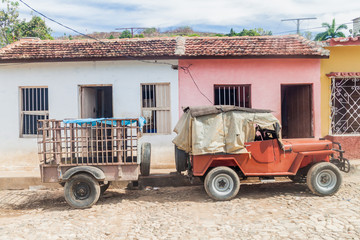 Old car with a trailer in Trinidad, Cuba.