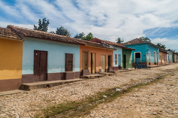 Fototapeta na wymiar View of a cobbled street in Trinidad, Cuba.
