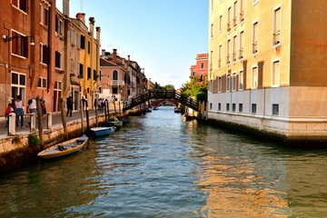 Toursits and the canal of Venice